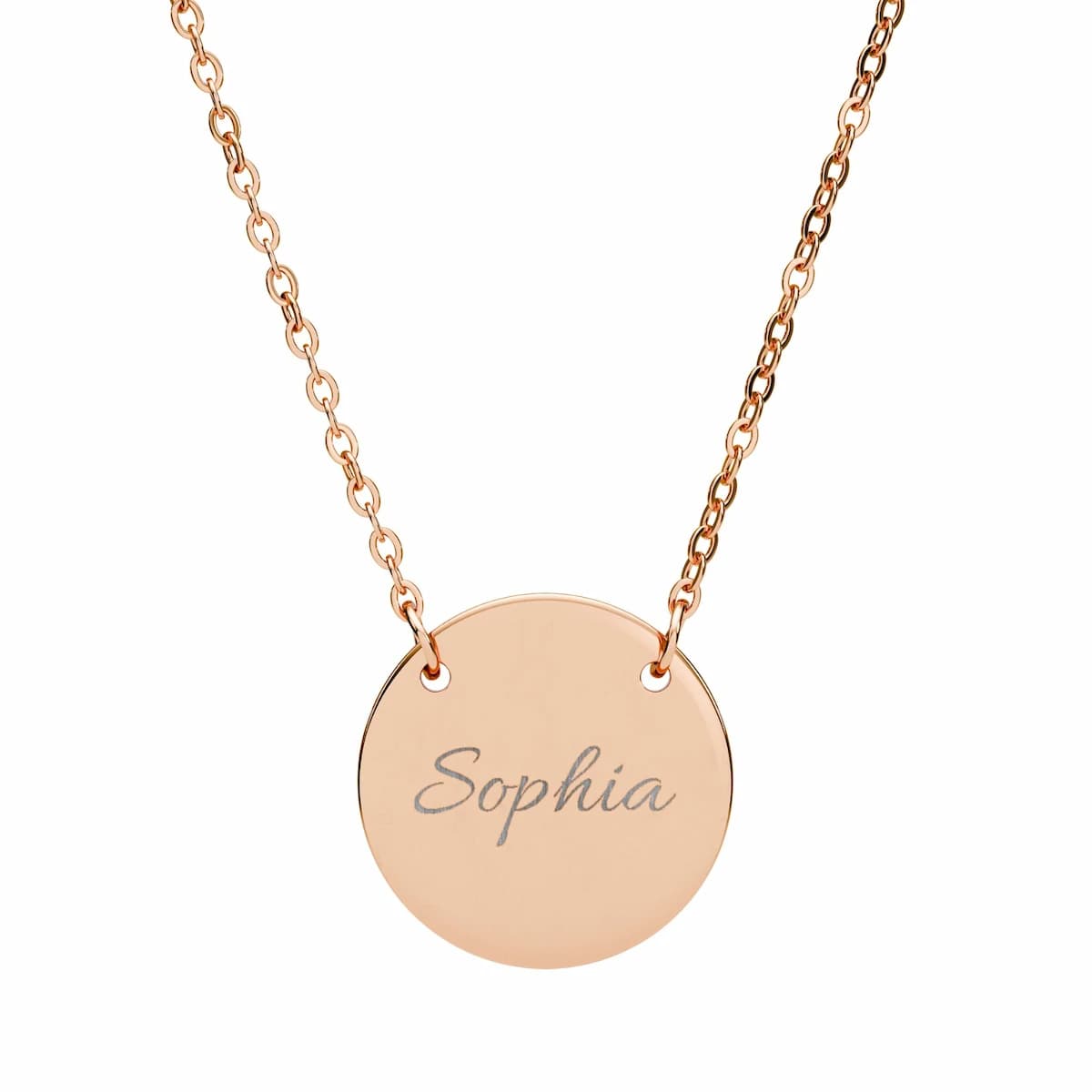 A name engraved on a steel pendant. High contrast, bold letterforms, no shading — this is what the process does well, at the scale it does it.