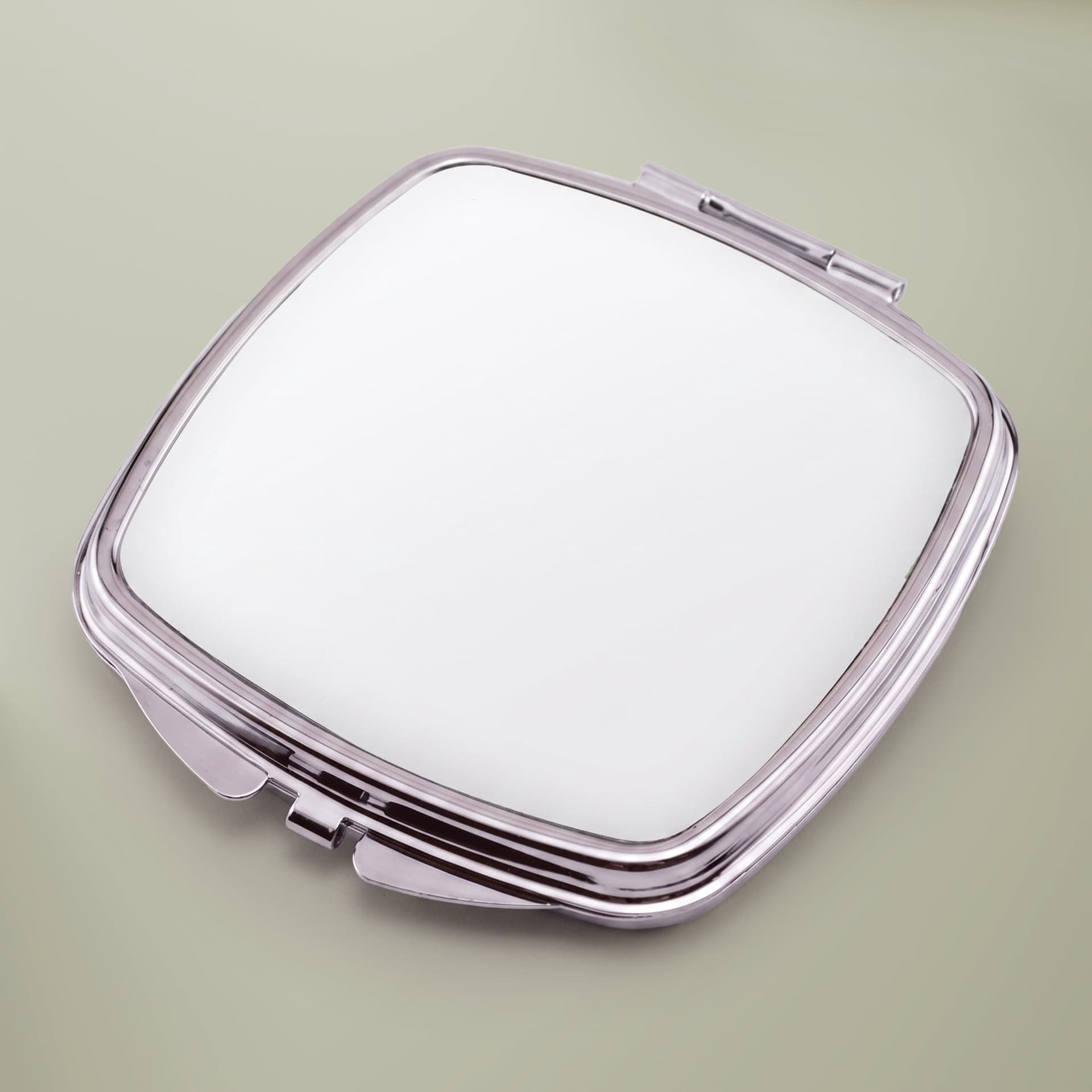Plain silver compact square mirror, front view