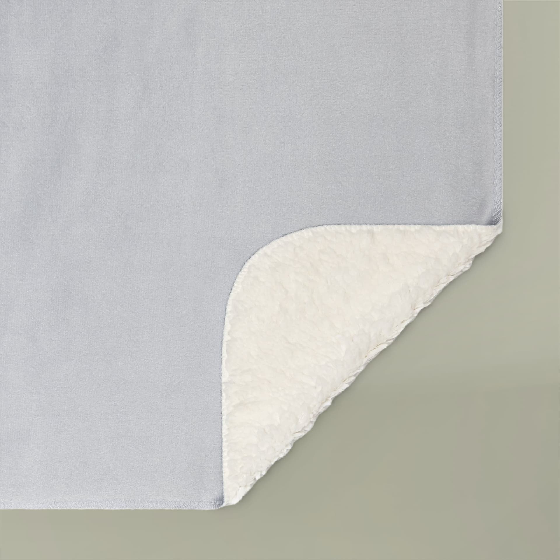 Plain white sherpa blankets, front view