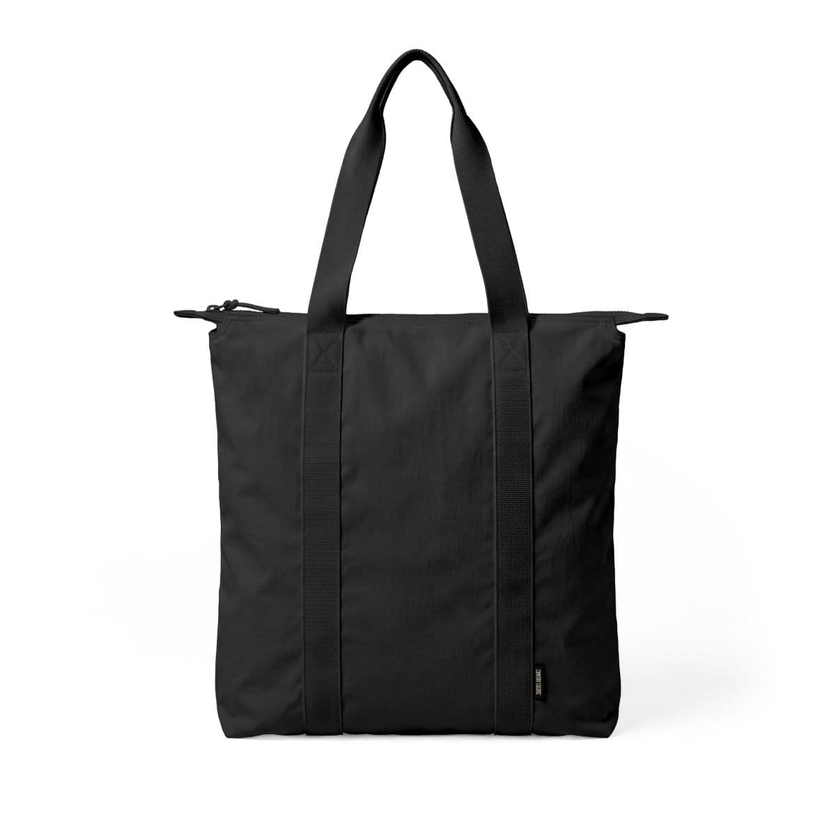 Plain black nomad carry-all tote bag, front view